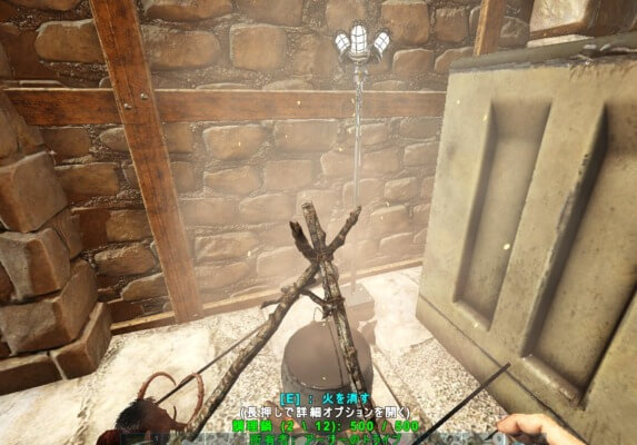 たき火の火でヒルを焼き殺す